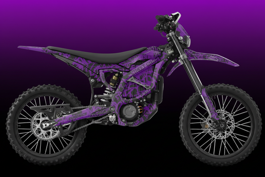 Purple dirt bike with black accents on a white background
